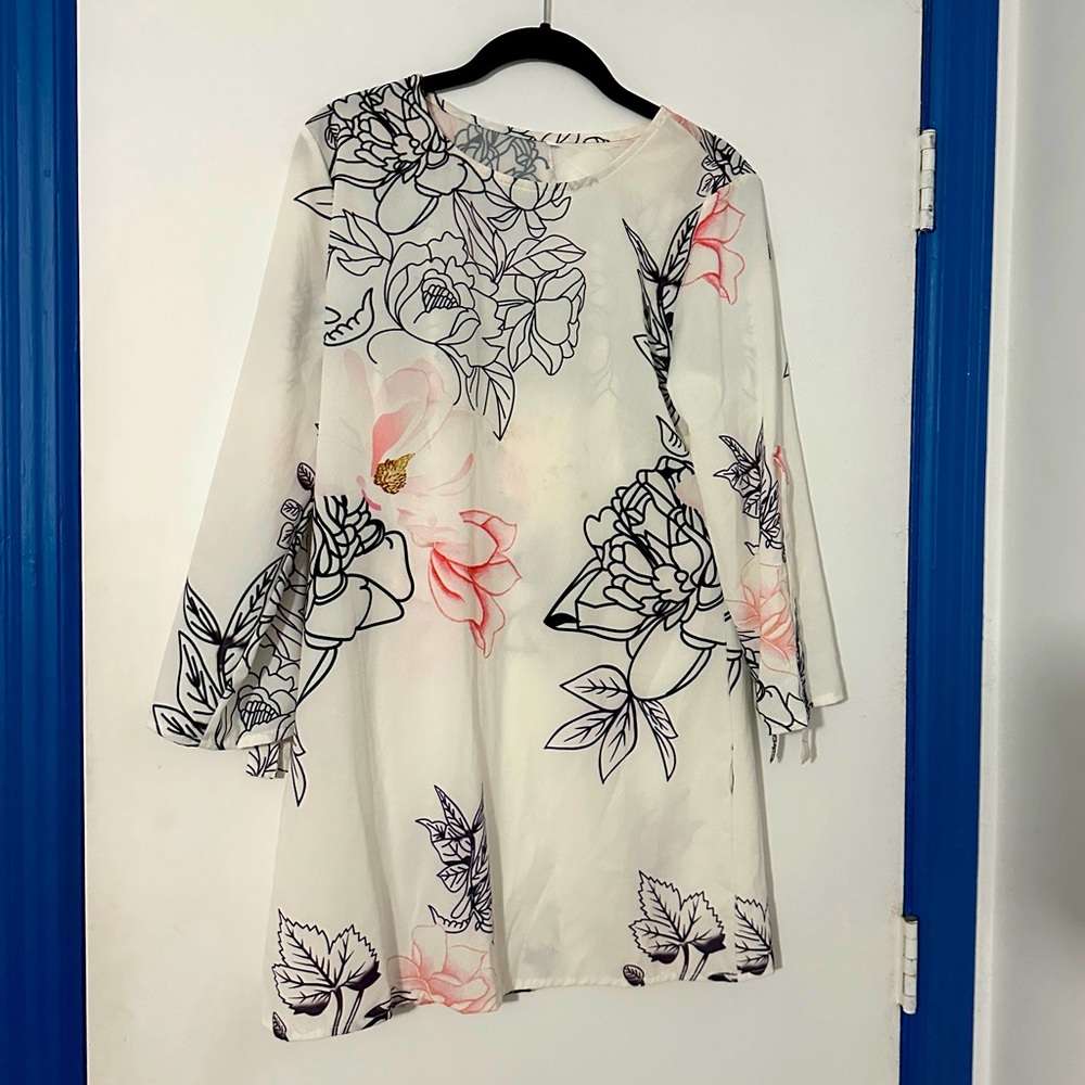 White dress with pink & back flower outlines